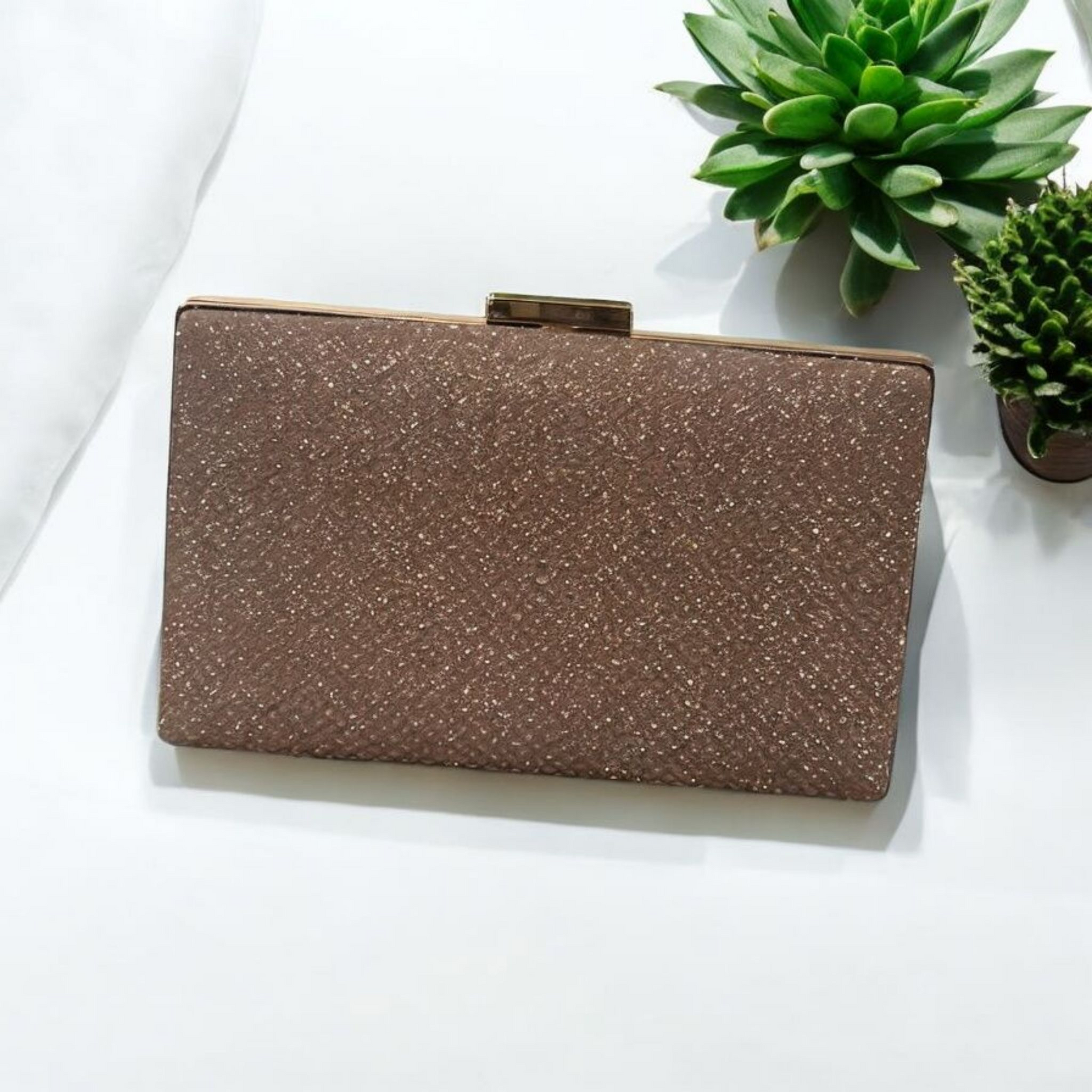 Rose gold women clutch